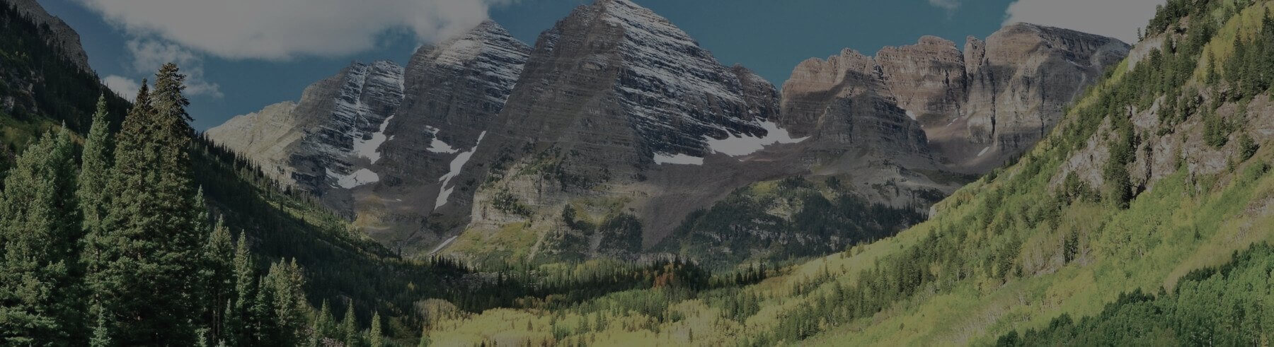 The Maroon Bells rising over the alpine landscape near Aspen